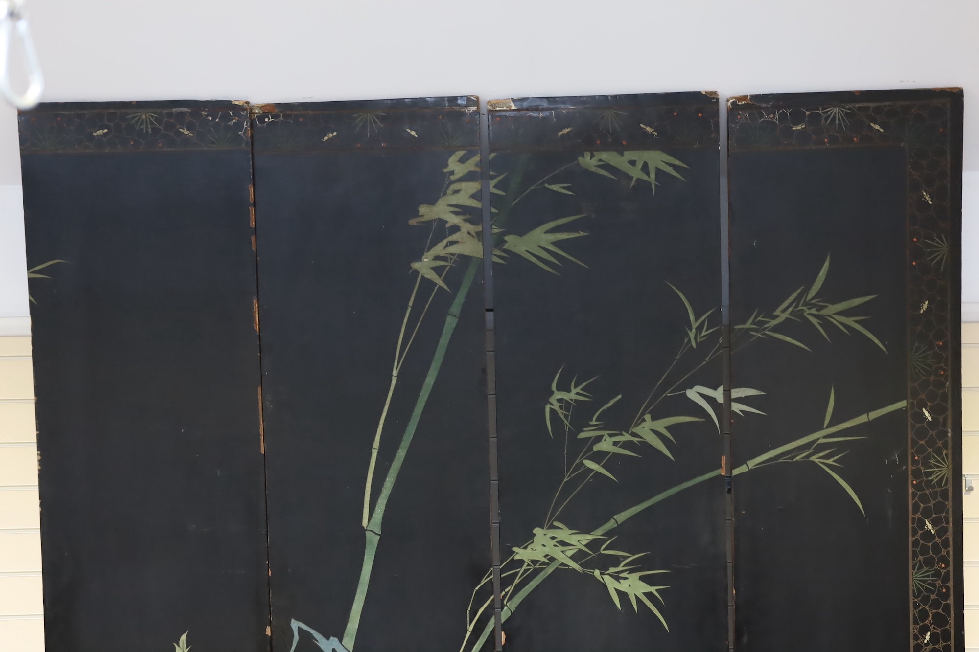 A tall Chinese coromandel lacquer twelve panel screen, 19th century, each leaf panel width 49cm, height 264cm